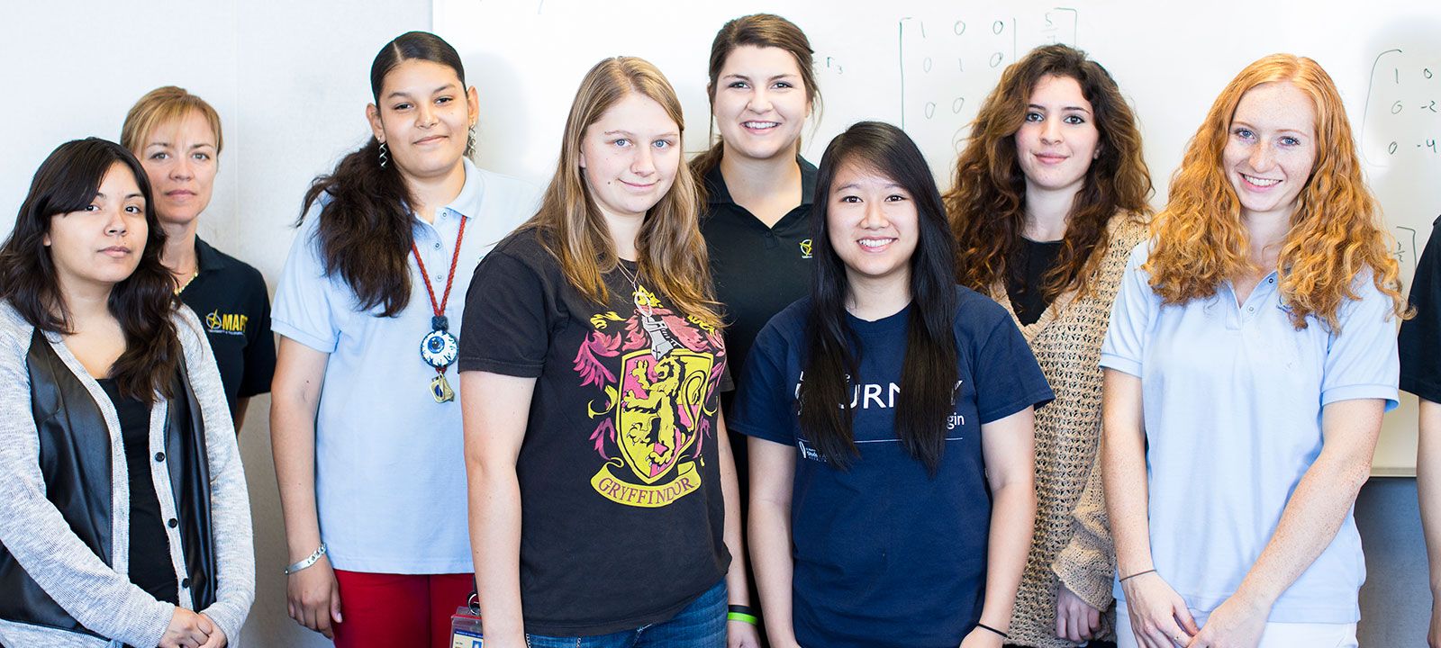 Female STEM students standing together