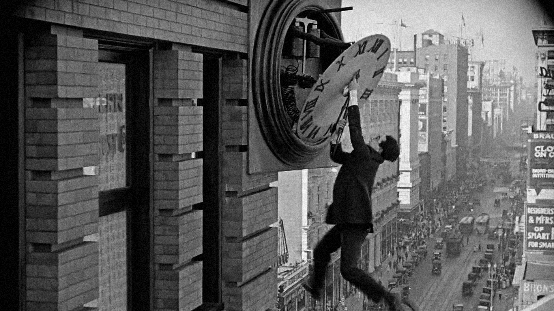 Harold Lloyd dangling from a clock in the film Safety Last