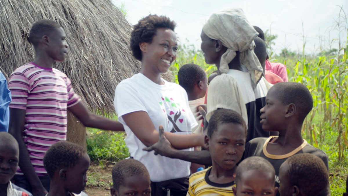 Lydia Natoolo embraces a woman near Atutur Hospital