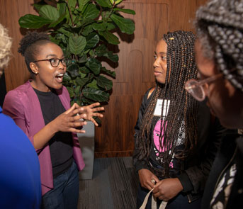 UCLA's Nyasha Maforo chats with Black Girls code student Adore Whitfield