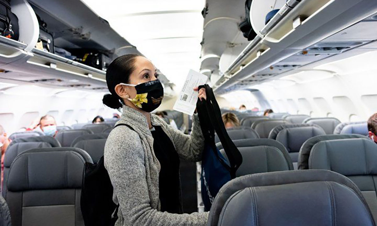 Woman boarding flight