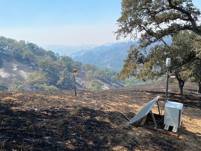 Equipment on a fire-blistered hill