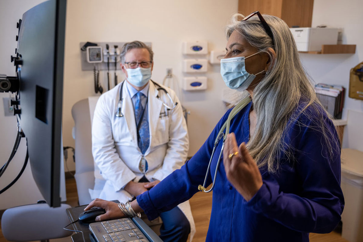 Doctor's office with two medical personnel