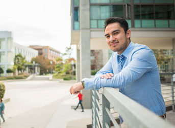 Oscar Hernandez portrait on a balcony