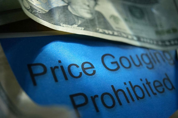 Twenty dollar bill and price gouging warning