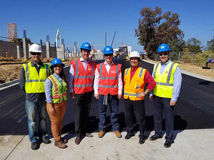 Group photo of Steve Weihe and Chelsea Klaseus, representing the City of the San Diego’s Environmental Services Department, MacRebur co-founder Gordon MacRebur, MacRebur CEO Toby McCartney, and Gary Oshima and Ted Johnson of UC San Diego