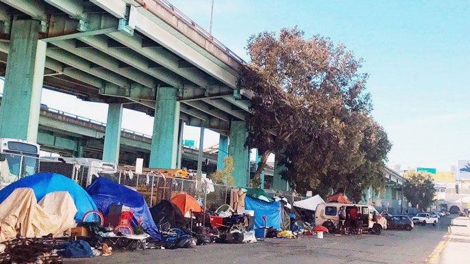 homeless encampment lining a San Francisco street