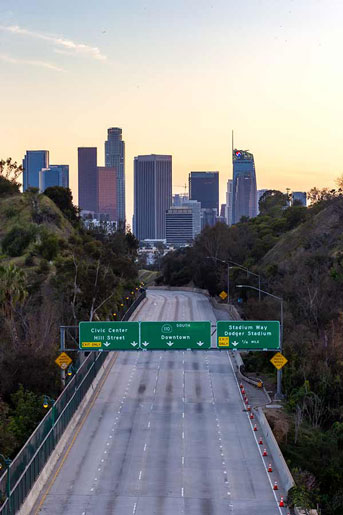 Deserted freeway with sky above