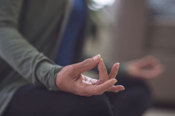 Posture of woman meditating