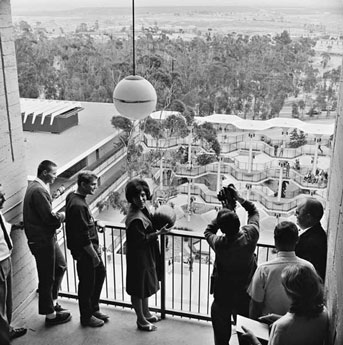 Students ready to drop a watermelon off balcony old photo