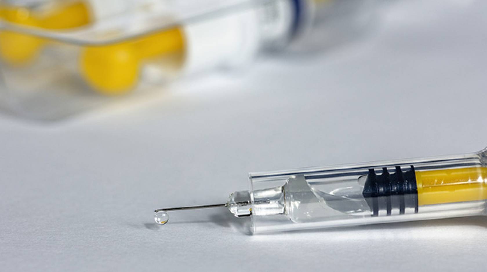 syringe and vials of medicine