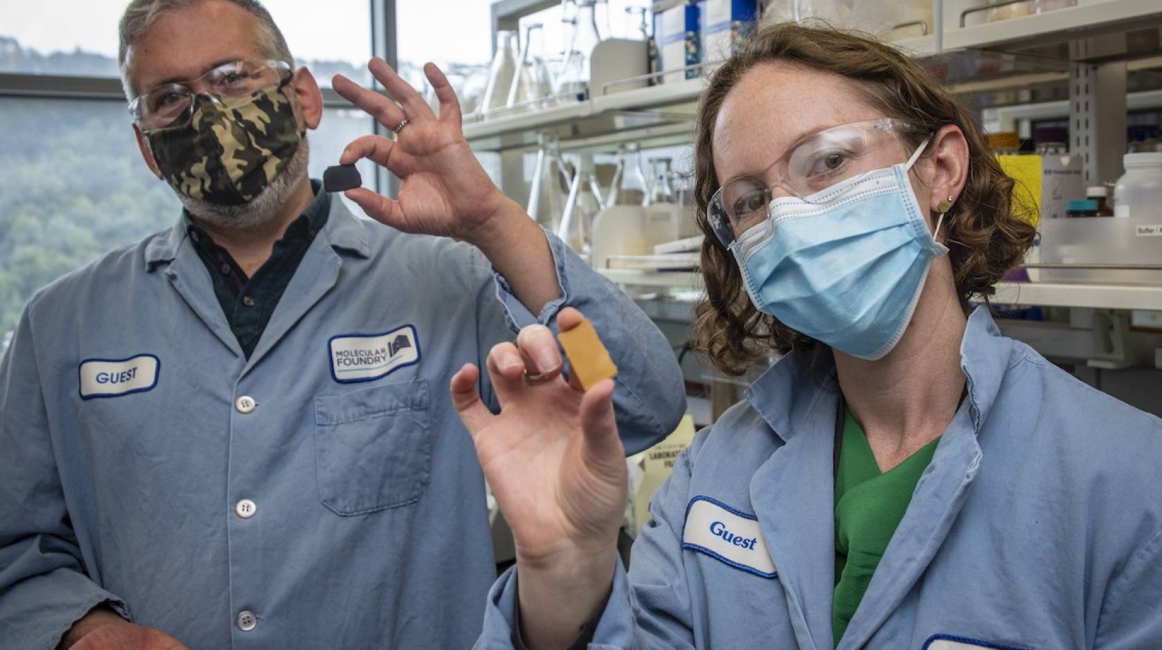 Berkeley Lab scientists Brett Helms and Corinne Scown hold samples of PDK plastic, a unique new material that can be recycled indefinitely