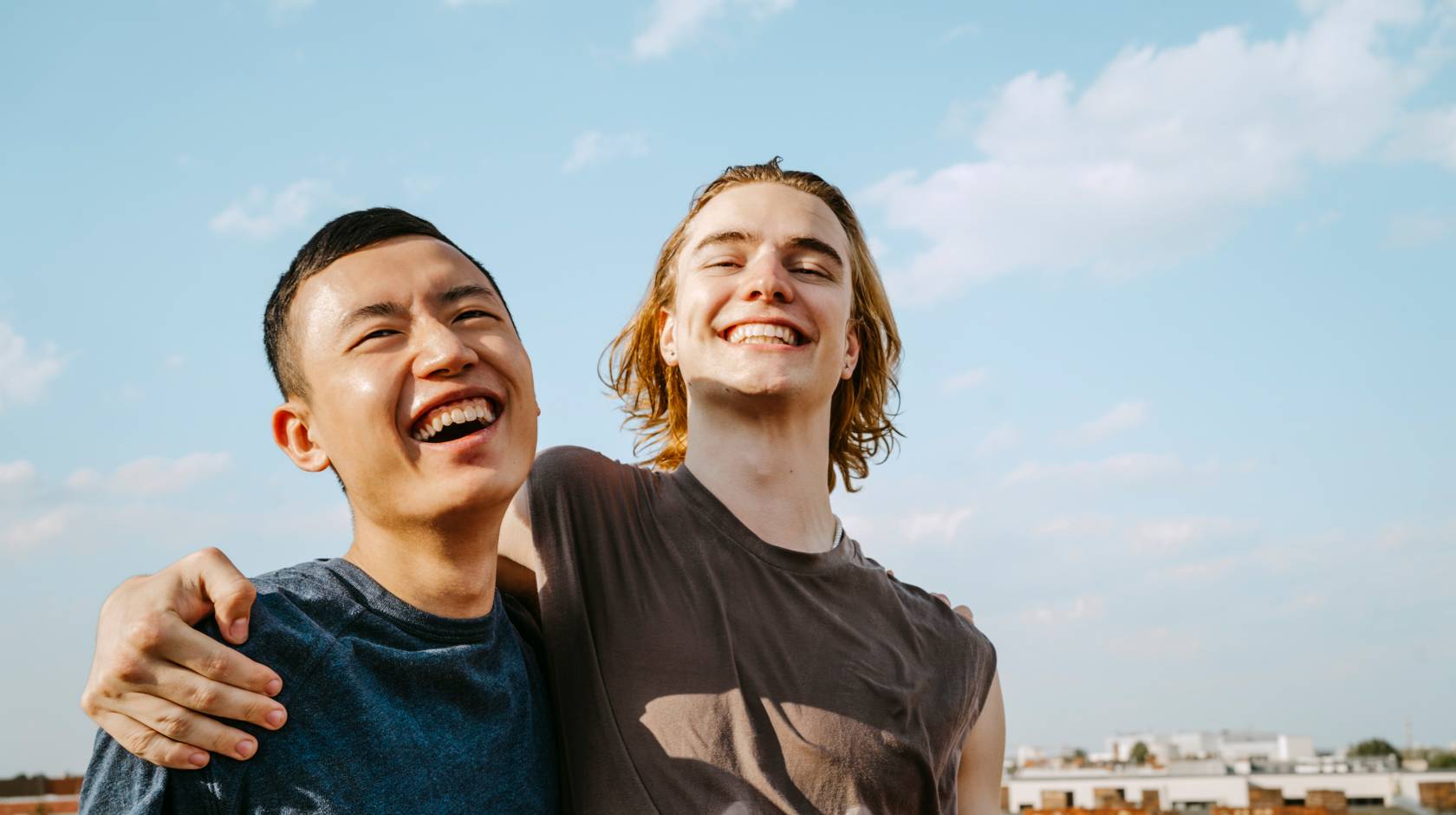 two friends laughing together