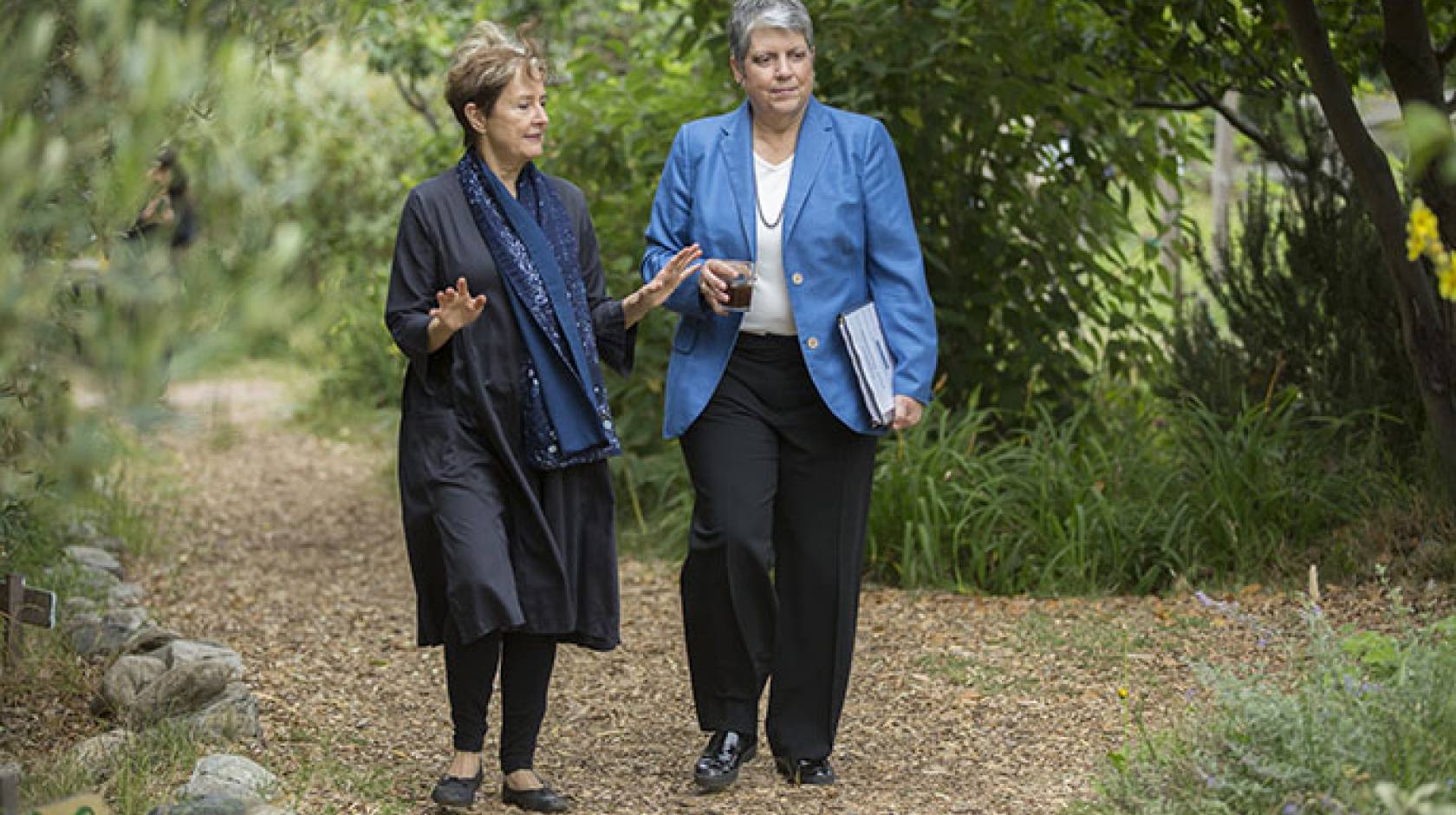 Alice Waters (left) tours the Edible Schoolyard in Berkeley with UC President Janet Napolitano at the launch of the UC Global Food Initiative.