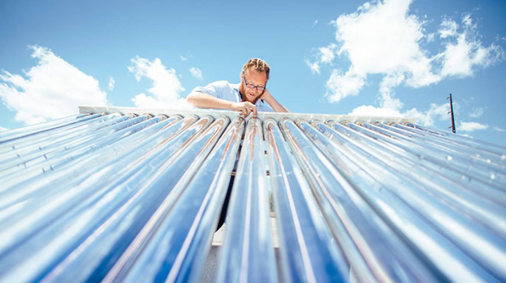 Man on solar tubing