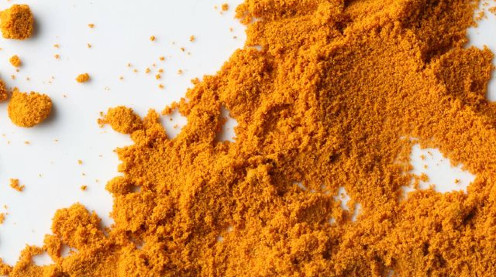 Powdered tumeric, the spice that contains curcumin. 