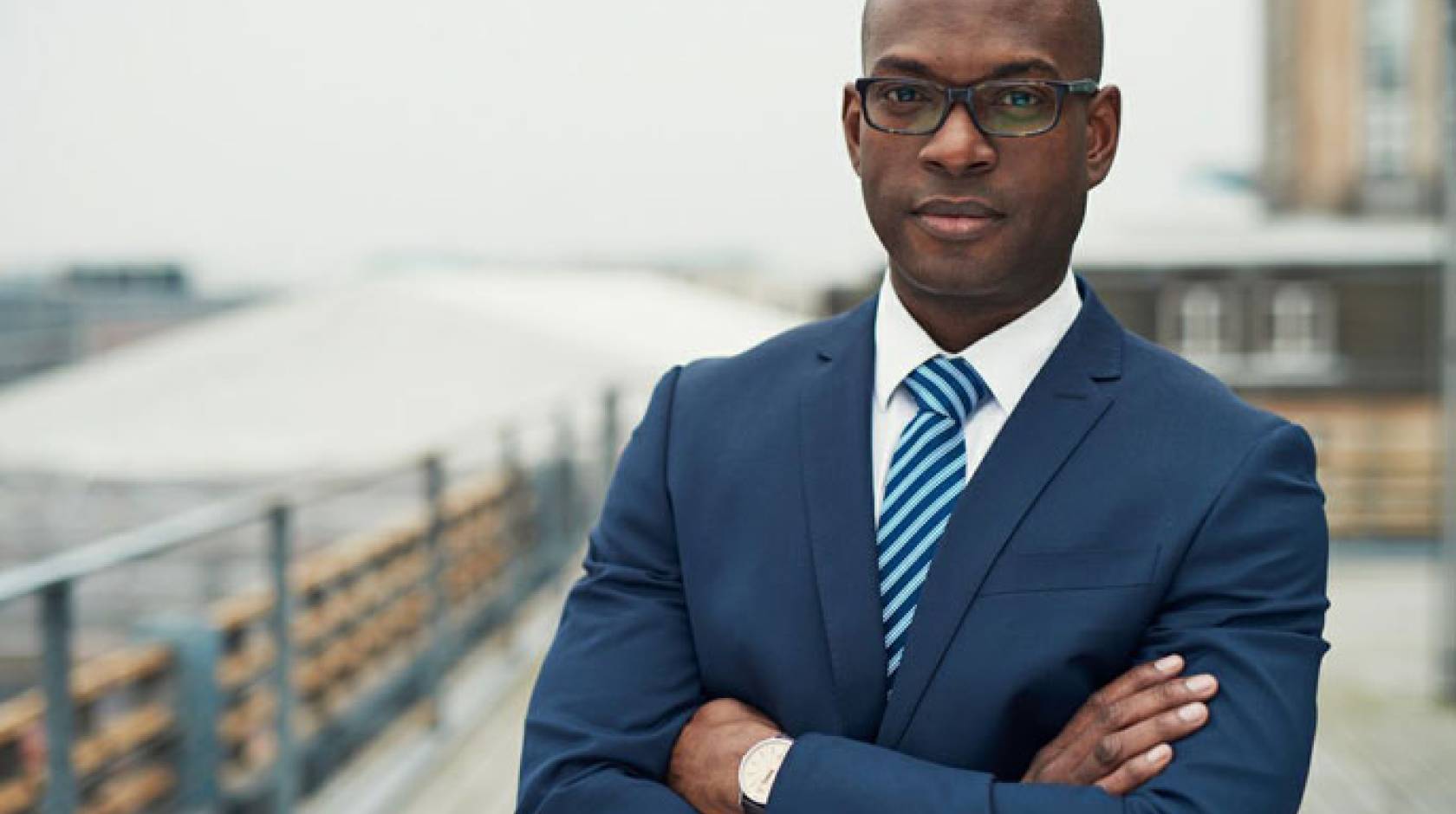 Young Black professional in blue suit