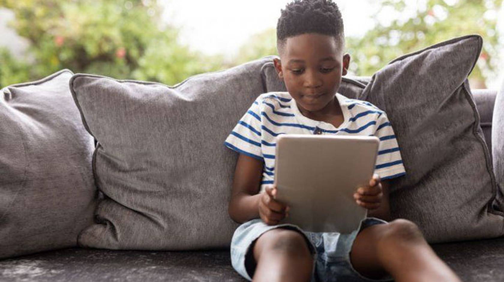 Boy holding tablet