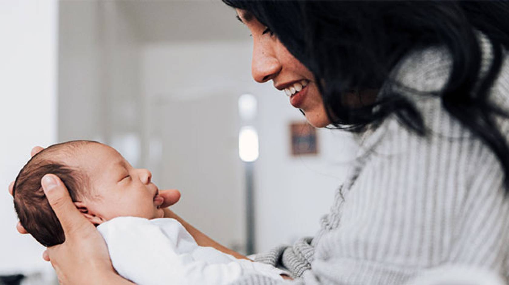 Woman looking at child