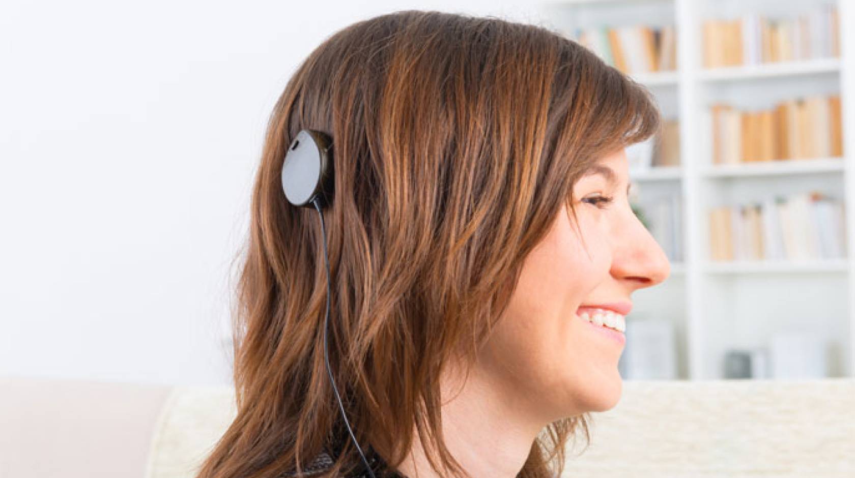 Woman with a cochlear implant