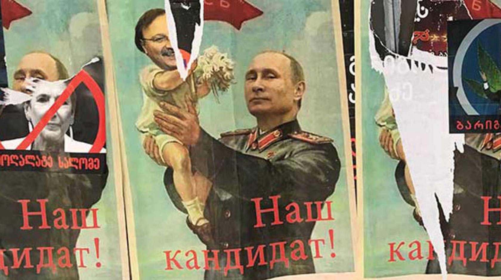 Election posters featuring Putin