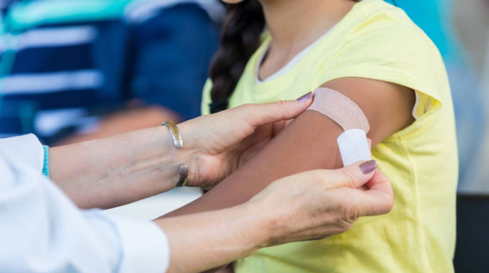 Arm bandaged after getting a flu shot