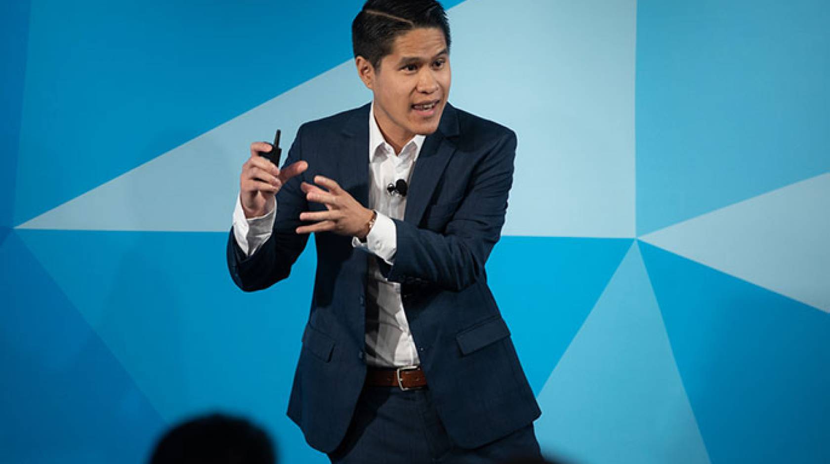Kevin Pham gives a Grad Slam presentation in 2019