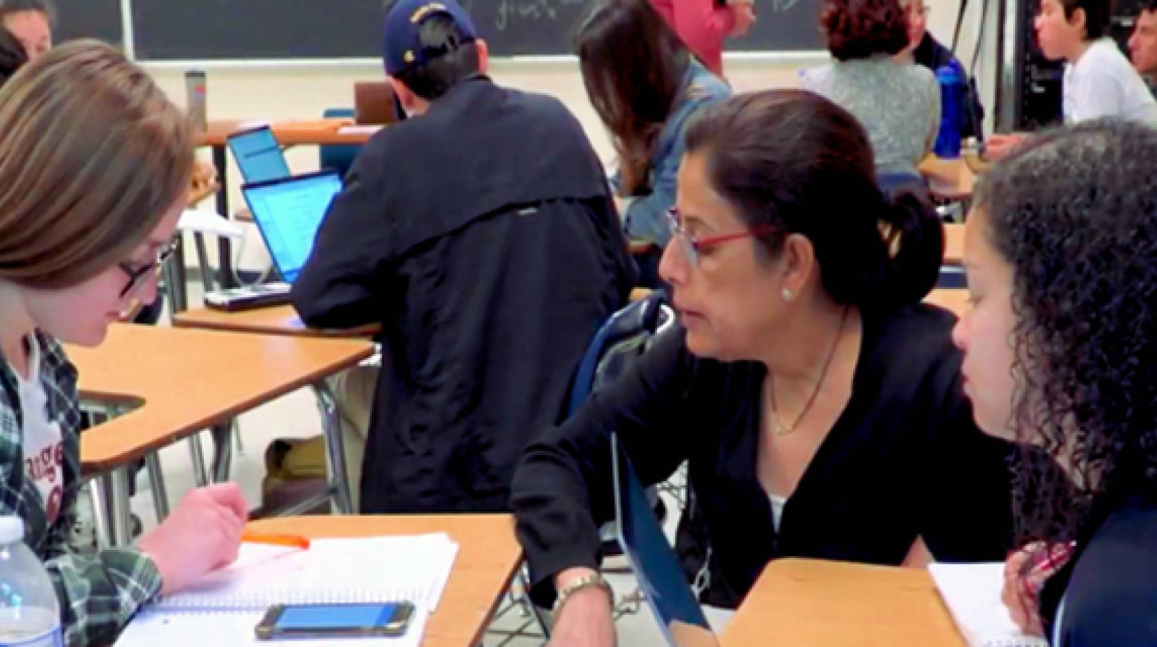 UC Santa Cruz students engage in small group active learning teaching sessions during a lecture.