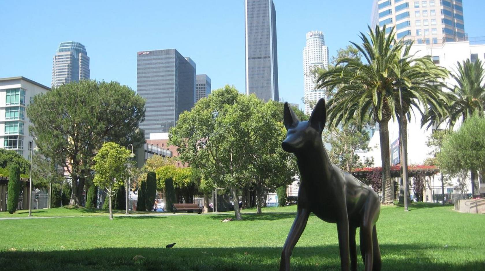 View of an urban LA park with a coyote statue