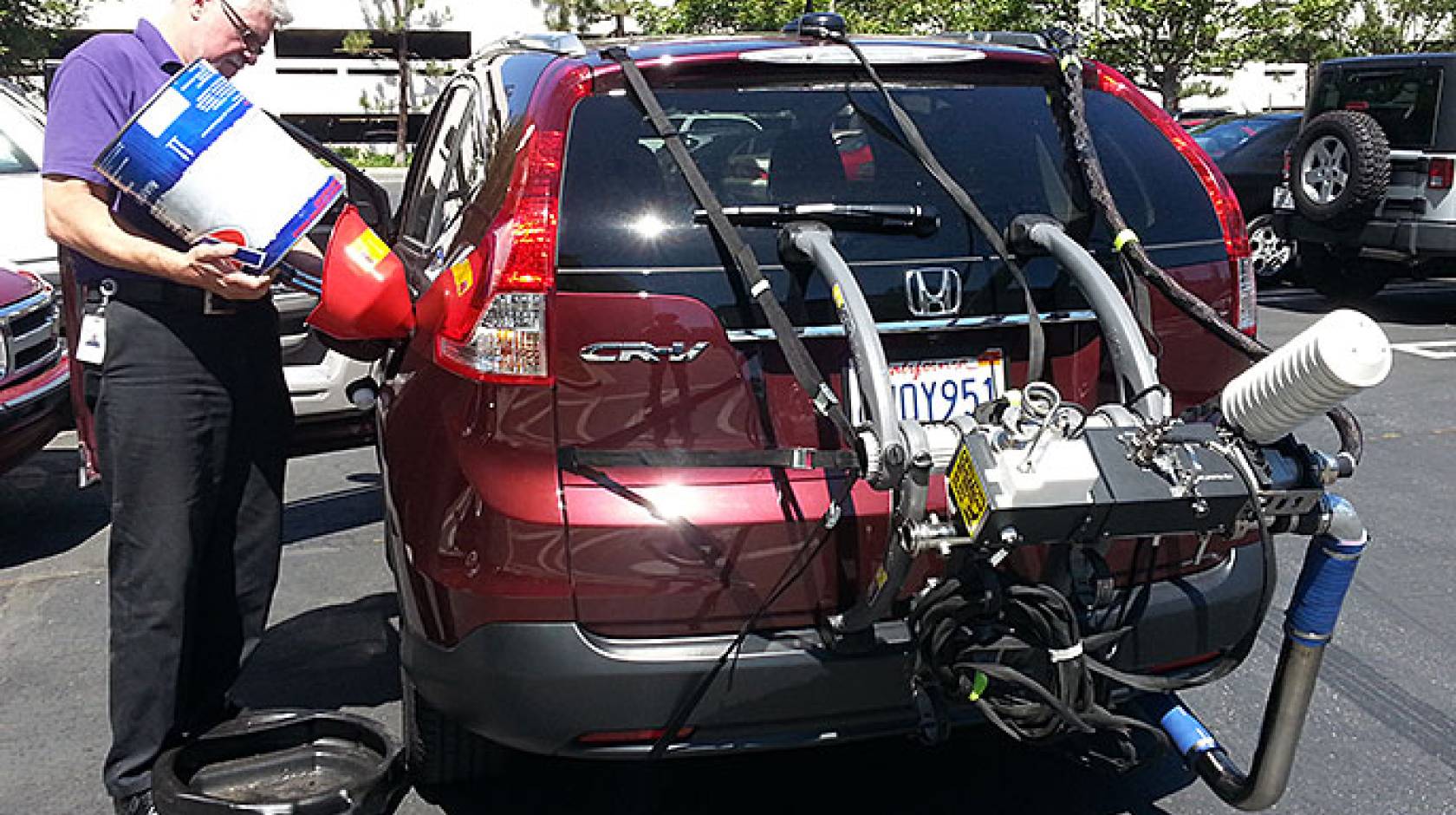 fueling up Honda CR-V