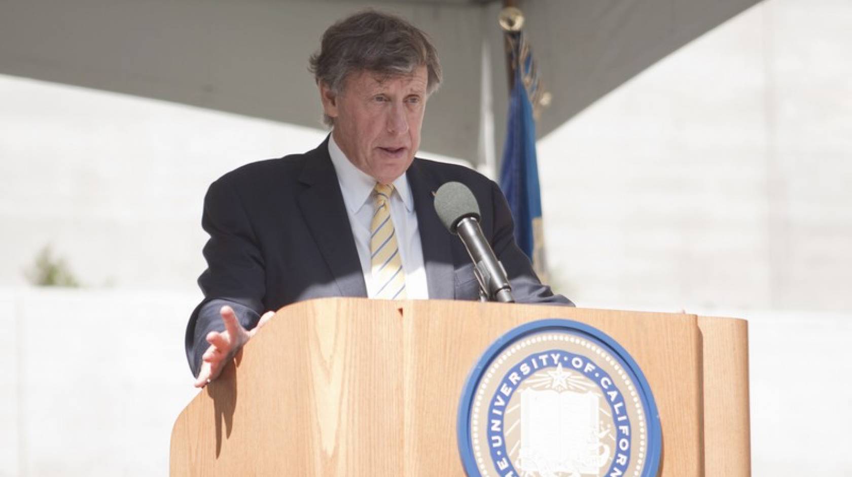 UC Regent Richard Blum at a UC podium