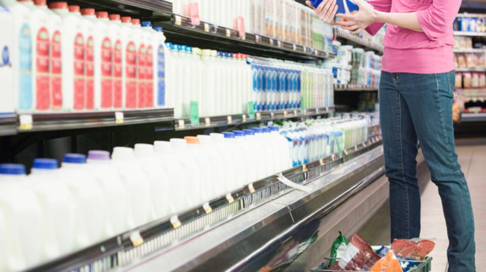 woman in milk aisle, supermarket