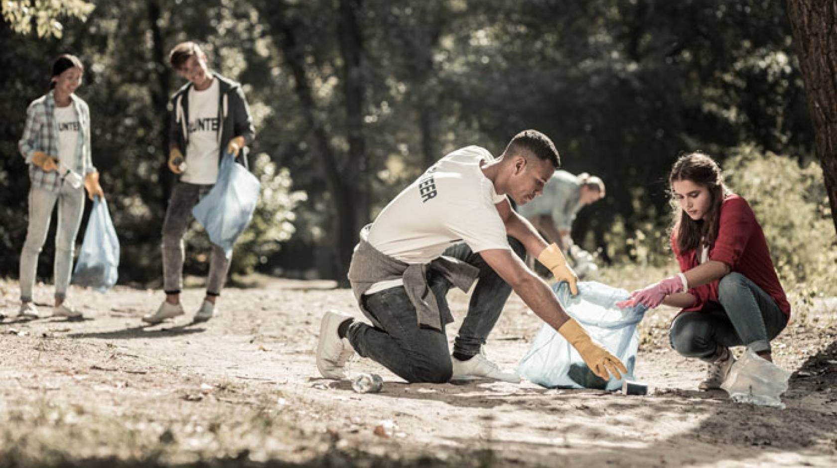 Teens doing some outdoor gardening