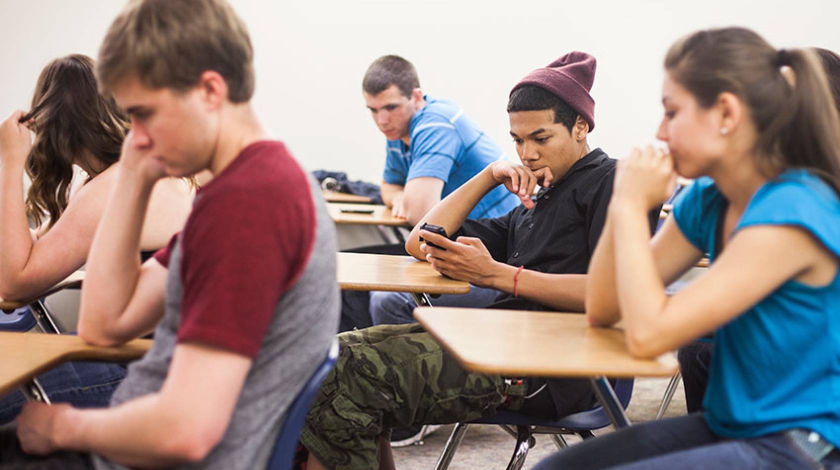 High school students texting in class