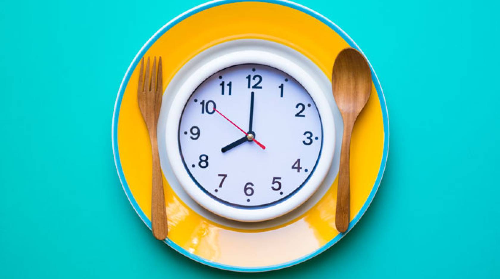 A clock on a dinner plate