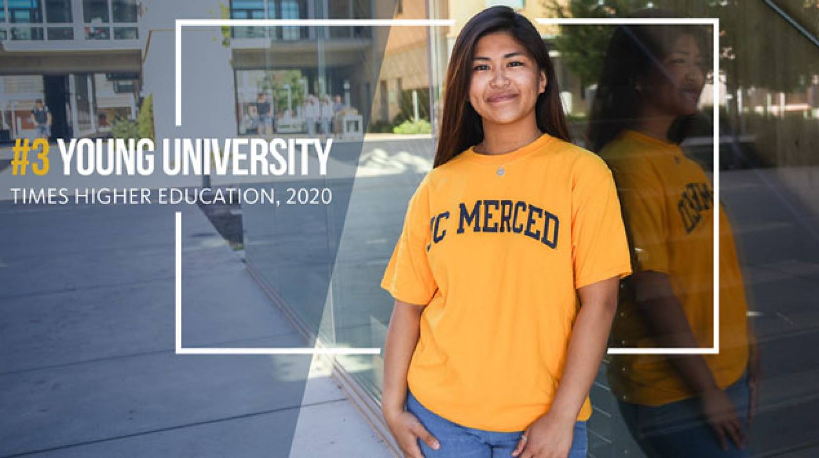 Times Higher Ed UC Merced ranking text with student standing outside in UC Merced T-shirt next to it