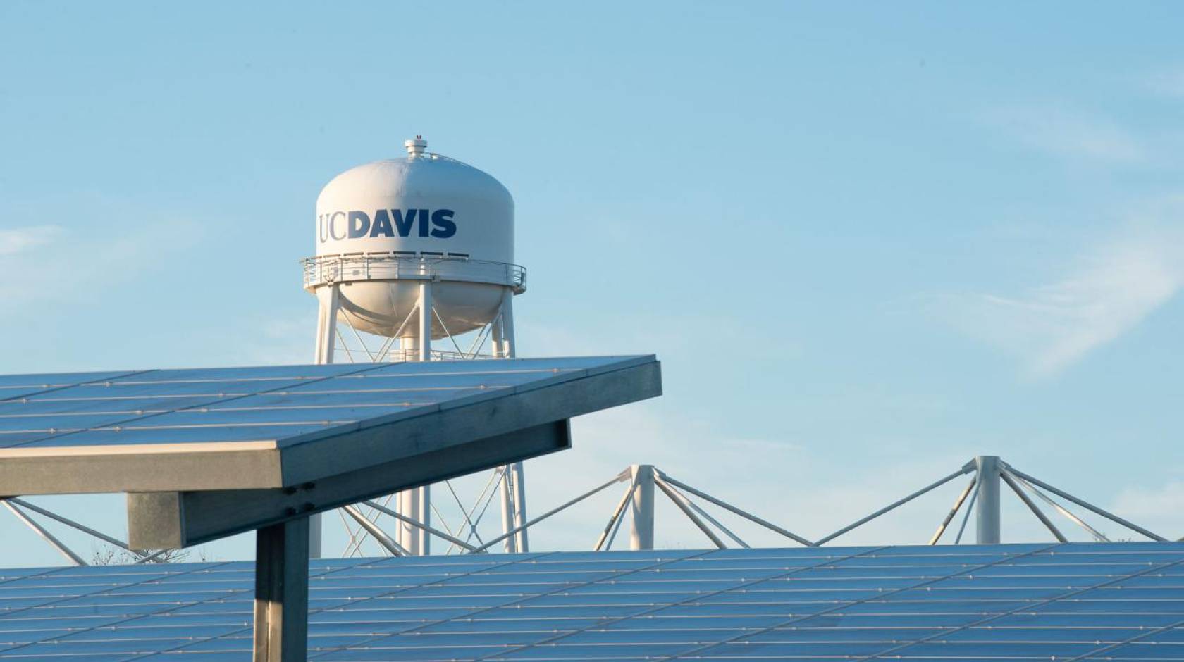 UC Davis water tower with solar panels in front