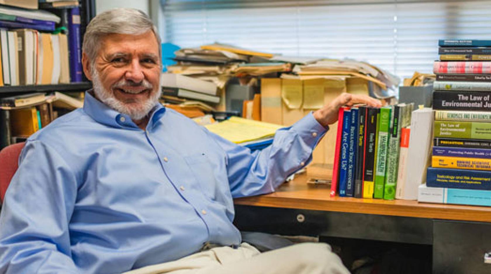 Carl Cranor with his books