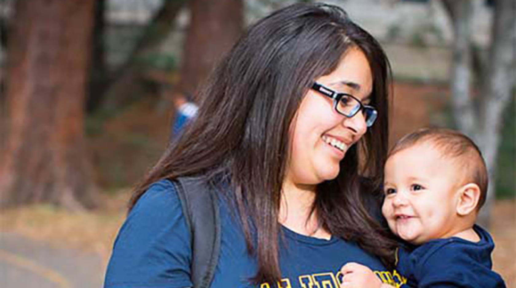 American Studies major Esperanza Campos, holding son Mauricio Ferrer, says the Cal Nourish gift cards “make a lot of difference” to student parents. 