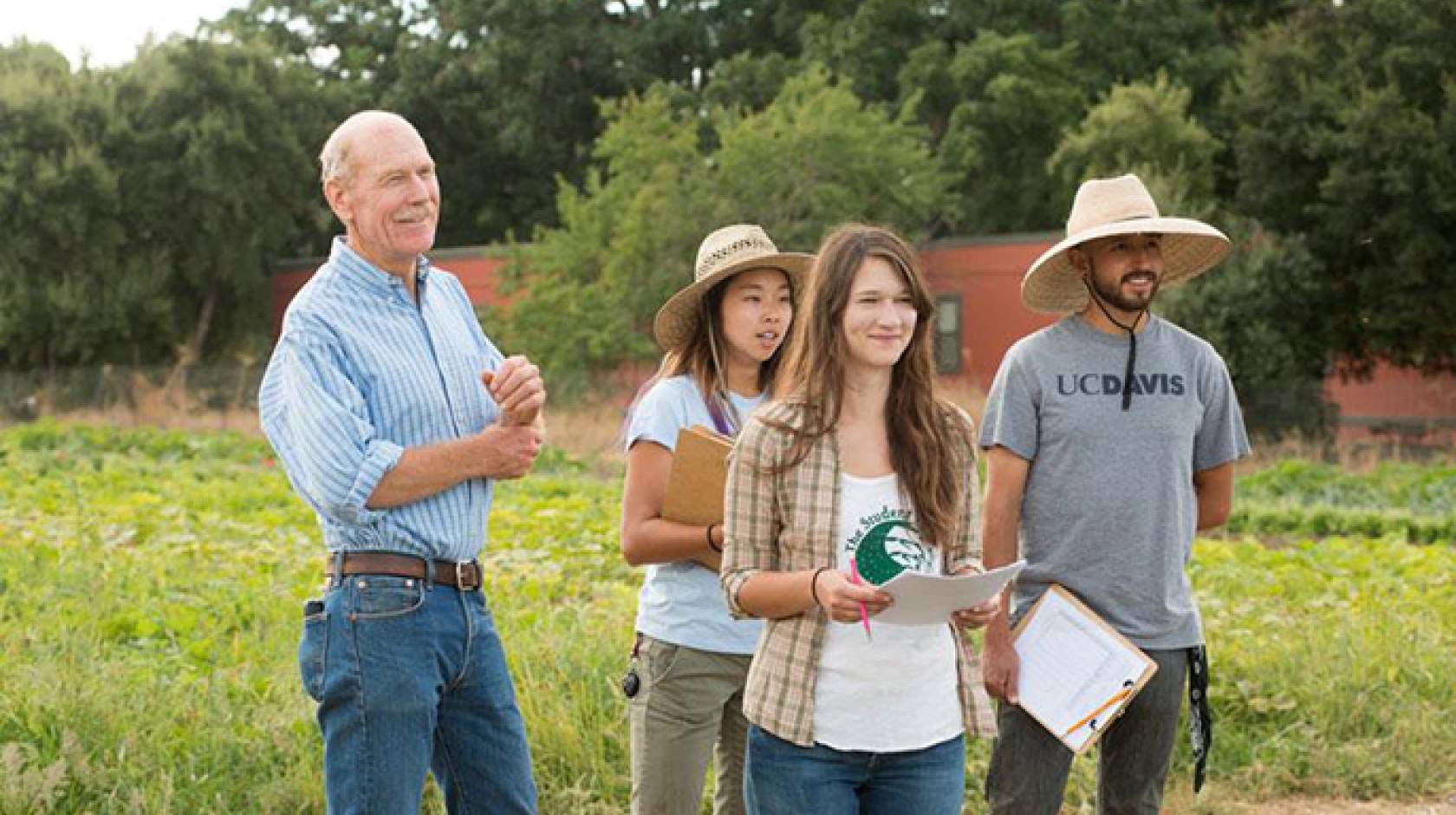 UC Davis Student Farm Director Mark Van Horn and some of his students last year, from left, Alexis Fujii, Mary Laurie and Abraham Cazares. 