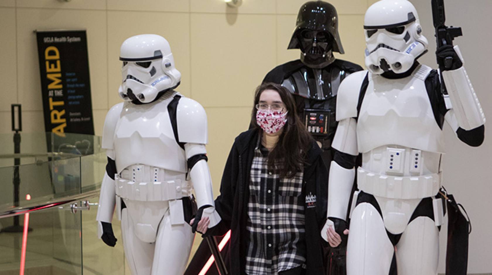 Following a lung transplant, Kathlyn Chassey makes a triumphant exit from the Reagan UCLA Medical Center on Wednesday, Jan. 11, accompanied by Darth Vader and storm troopers from "Star Wars."