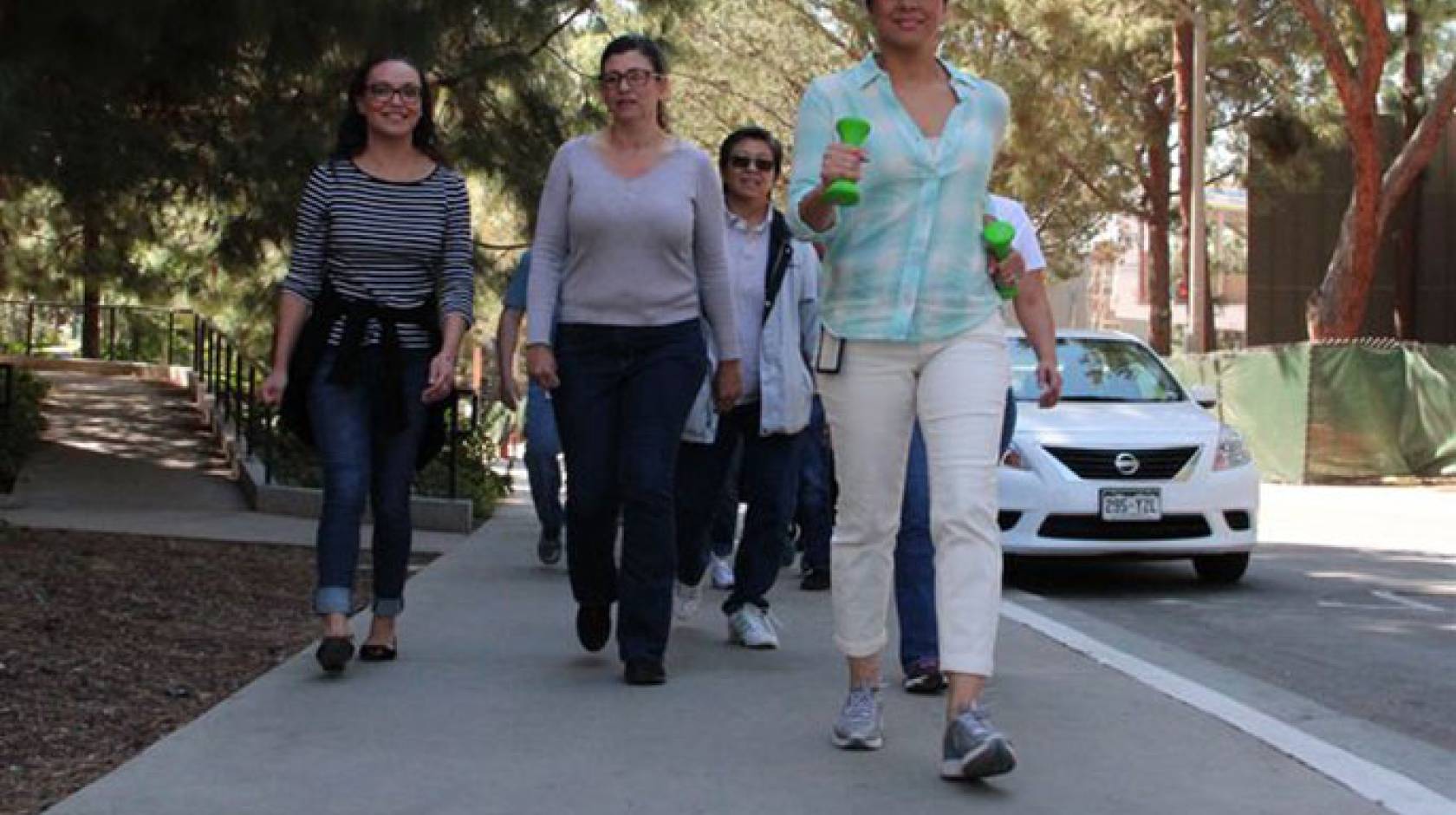 Luz Torres-Gonzalez, in front, is one of more than a dozen UCLA staff, students and faculty who will be recognized by the UCLA Healthy Campus Initiative at its inaugural symposium for their contributions to campus health and wellness.