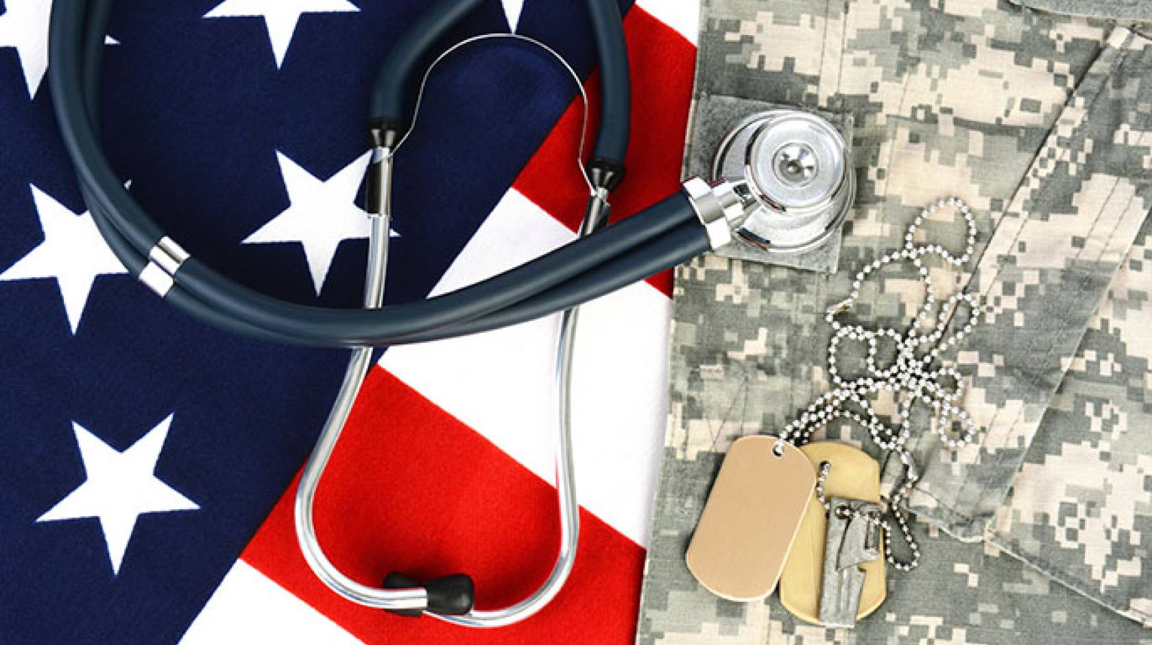photo illustration: US flag, military fatigues, dog tags, stethoscope