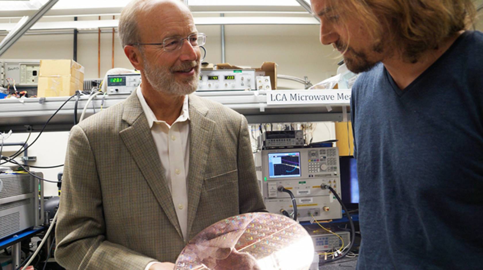 UC Santa Barbara's John Bowers (left) is among 12 UC innovators elected to the National Academy of Inventors.