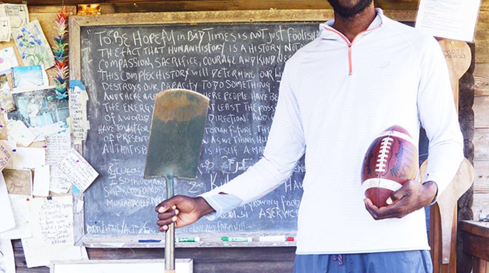 Former NFL defensive end Kalimba Edwards traded a mansion for a tent cabin on the UC Santa Cruz Farm where he is an apprentice in the ecologial horticulture program.