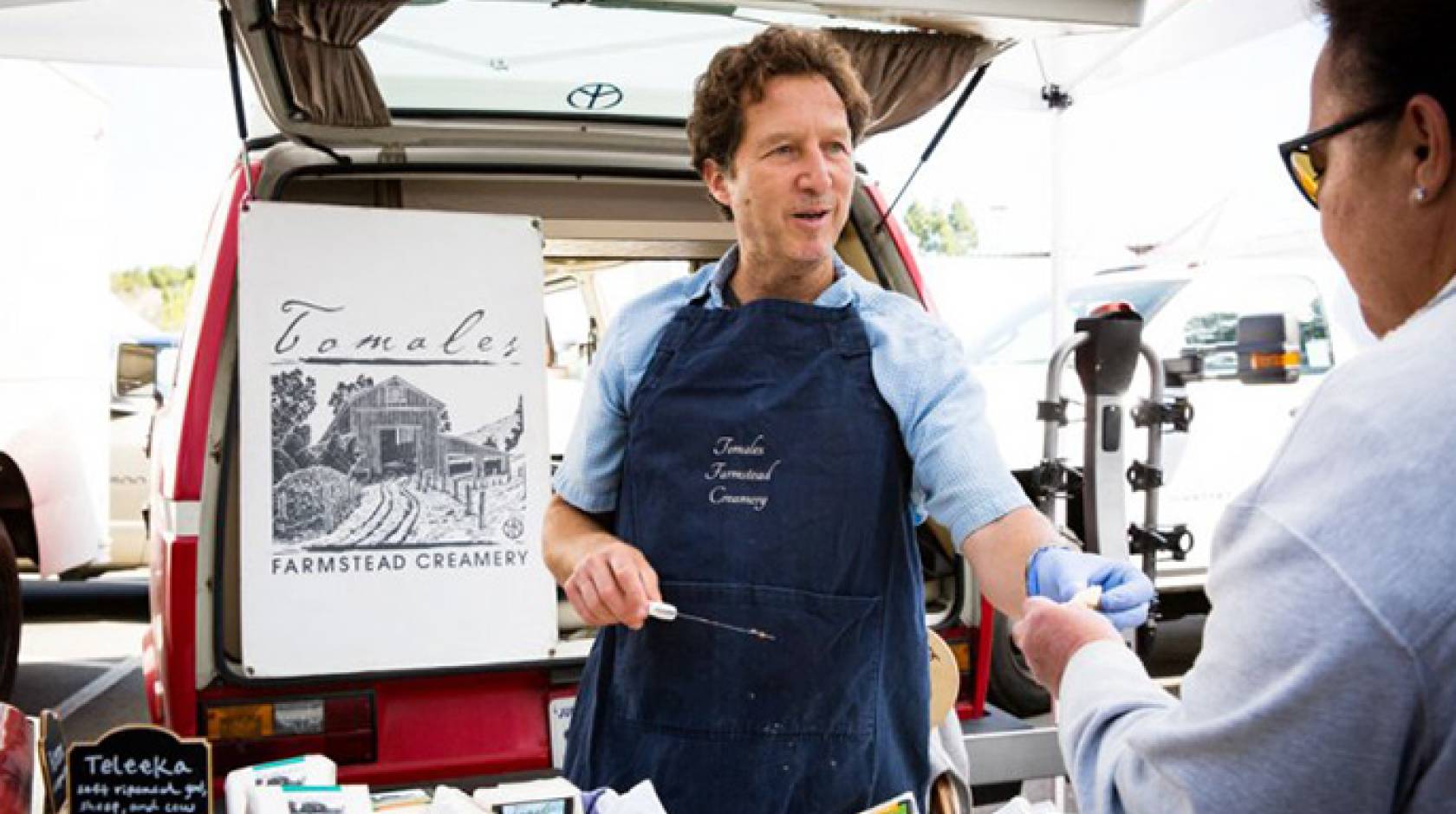 David Jablons, chief of thoracic surgery at UCSF Medical Center, sells his cheeses at the San Francisco Ferry Building farmers market on weekends. 