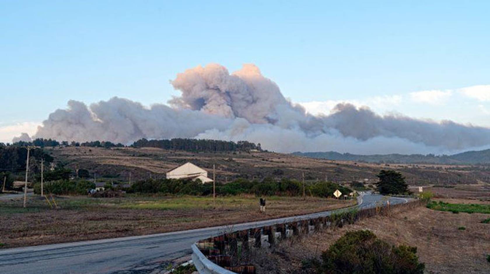 Cloud from a wildfire over a hill near Santa Cruz