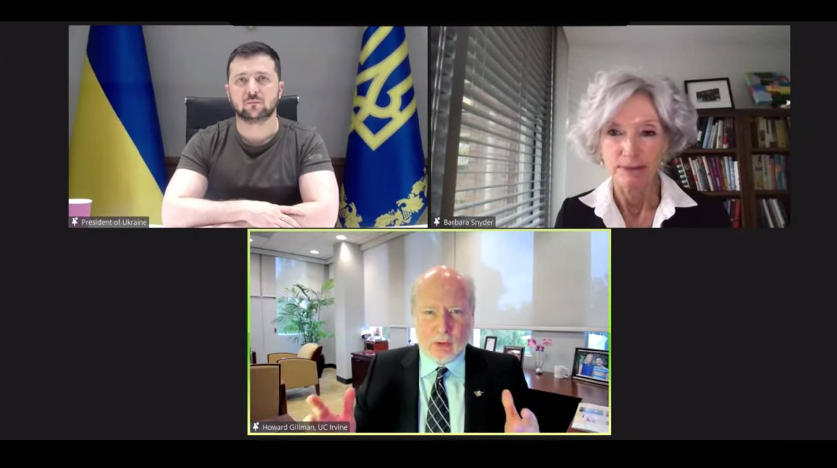 Zoom meeting between Ukrainian President Volodymyr Zelenskyy and AAU members. UC Irvine Chancellor Howard Gillman speaking to Zelenskyy while AAU President Barbara Snyder moderates.