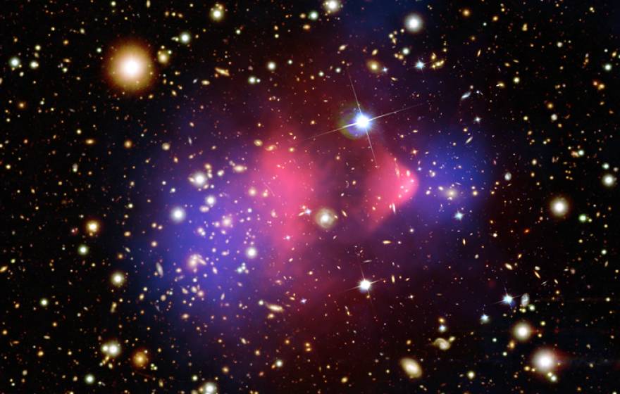  composite image of the “bullet cluster,” a galaxy cluster formed by a collision of two clusters.