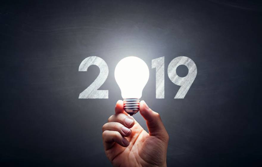 2019 graphic with someone holding a lightbulb